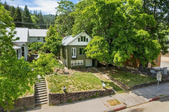 5985 Dunsmuir Ave, Dunsmuir, CA 96025 - view of front of home featuring an attached garage and stairway