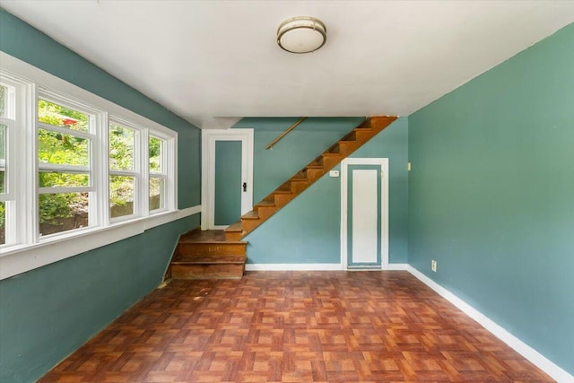 5985 Dunsmuir Ave, Dunsmuir, CA 96025 - unfurnished living room featuring stairway and baseboards