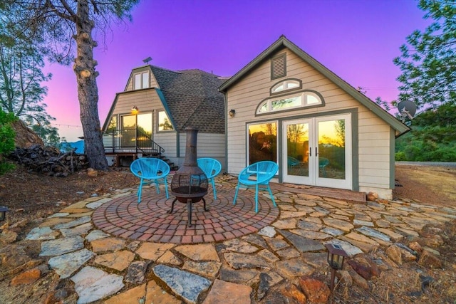 19028 Rocky Trl, Lakehead, CA 96051 - back of house with french doors, a patio, and a fire pit