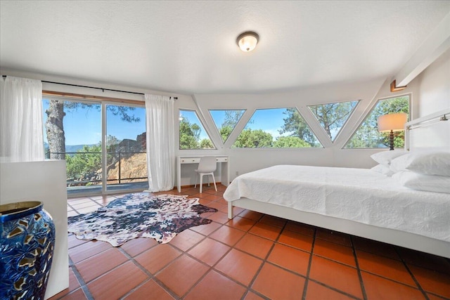 19028 Rocky Trl, Lakehead, CA 96051 - tiled bedroom featuring multiple windows and access to outside