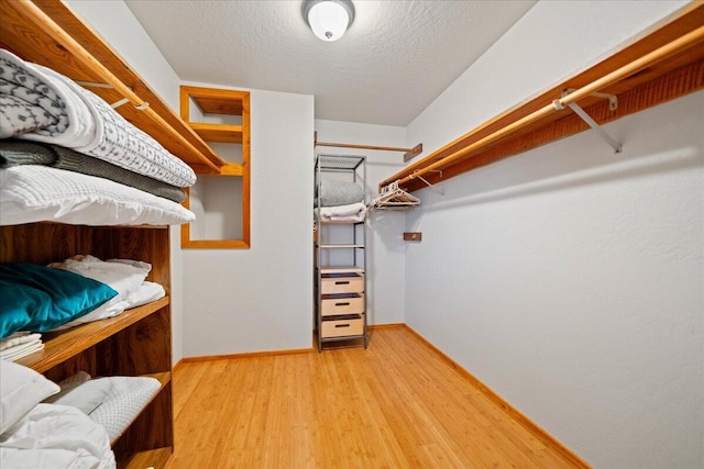 19028 Rocky Trl, Lakehead, CA 96051 - walk in closet featuring wood finished floors