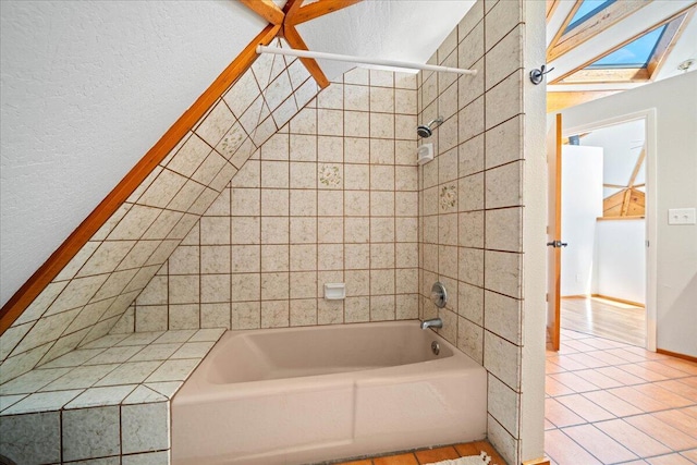 19028 Rocky Trl, Lakehead, CA 96051 - full bathroom with shower / washtub combination, tile patterned flooring, and a skylight