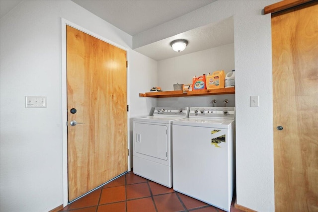 19028 Rocky Trl, Lakehead, CA 96051 - laundry room featuring washer and clothes dryer and dark tile patterned floors