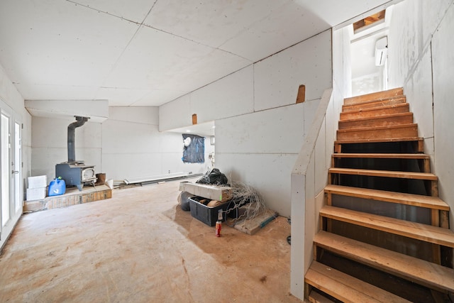 13599 Oak Run Rd, Oak Run, CA 96069 - finished below grade area featuring a wood stove and stairway