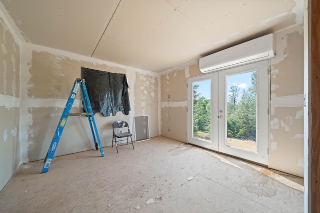 13599 Oak Run Rd, Oak Run, CA 96069 - unfurnished room featuring an AC wall unit and french doors