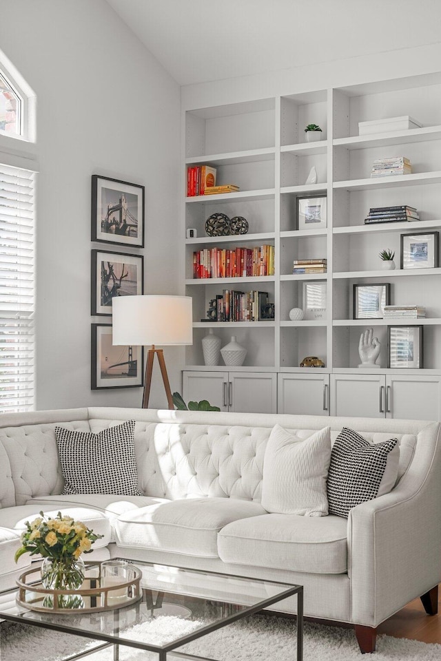 2154 Harvard Way, Redding, CA 96003 - living room featuring built in shelves and plenty of natural light