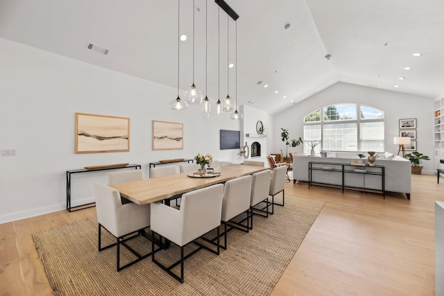 2154 Harvard Way, Redding, CA 96003 - dining room featuring lofted ceiling, light wood-type flooring, and recessed lighting