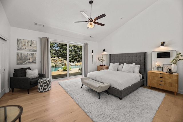 2154 Harvard Way, Redding, CA 96003 - bedroom with access to exterior, light wood-type flooring, a ceiling fan, and high vaulted ceiling
