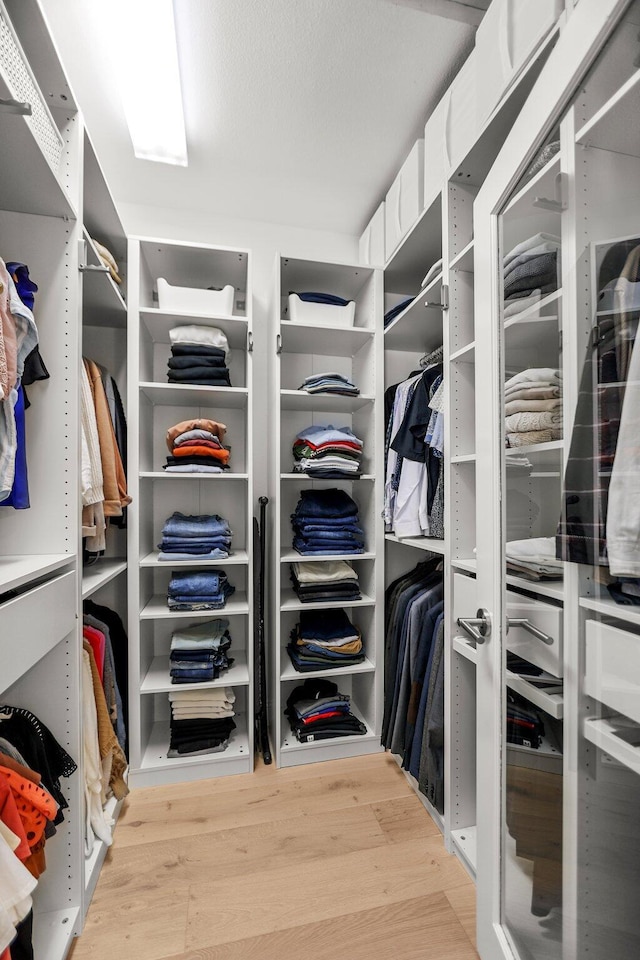 2154 Harvard Way, Redding, CA 96003 - walk in closet featuring wood finished floors