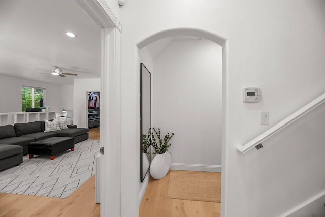 2154 Harvard Way, Redding, CA 96003 - corridor featuring wood finished floors, arched walkways, recessed lighting, and baseboards