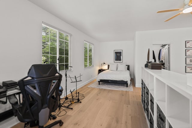 2154 Harvard Way, Redding, CA 96003 - bedroom with light wood-style floors, baseboards, and a ceiling fan