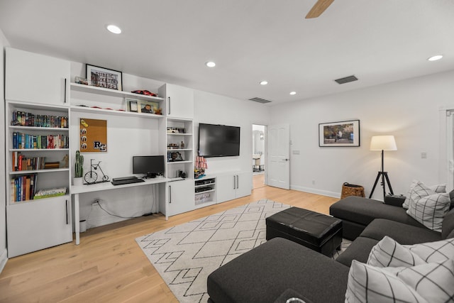 2154 Harvard Way, Redding, CA 96003 - living room with light wood-type flooring, recessed lighting, and an office area