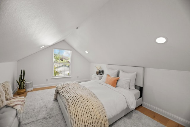 2154 Harvard Way, Redding, CA 96003 - bedroom with wood finished floors, baseboards, and lofted ceiling