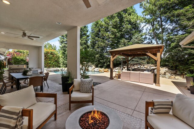 2154 Harvard Way, Redding, CA 96003 - view of patio / terrace with an outdoor living space with a fire pit, a ceiling fan, a gazebo, an outdoor pool, and area for grilling