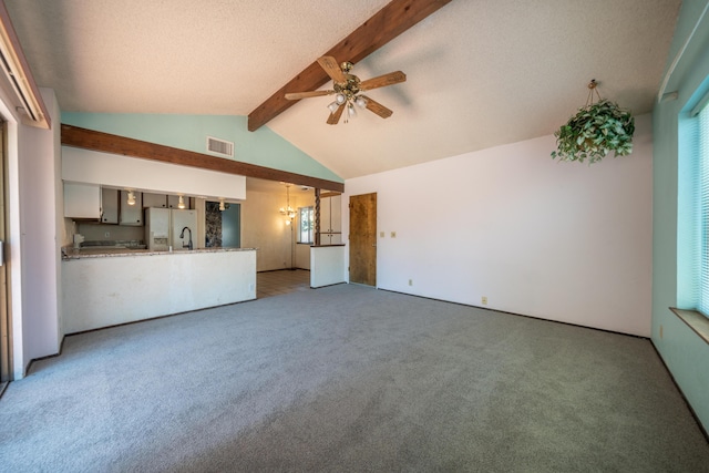 2683 Starlight Blvd, Redding, CA 96001 - unfurnished living room featuring ceiling fan, carpet, a chandelier, and a textured ceiling