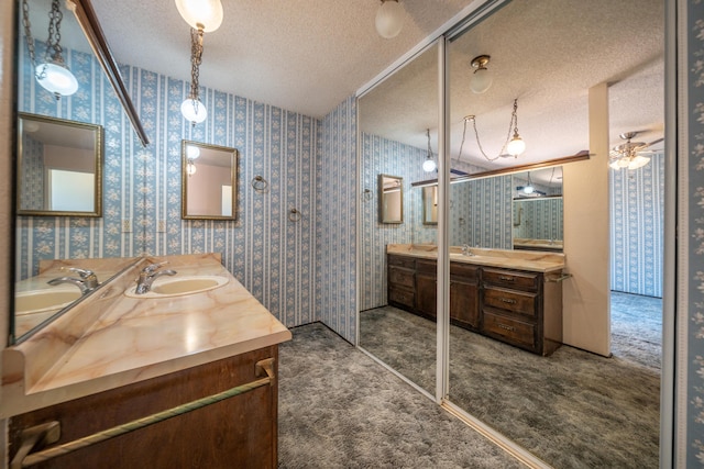 2683 Starlight Blvd, Redding, CA 96001 - full bathroom featuring vanity, a textured ceiling, and a ceiling fan