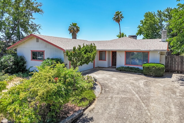 2683 Starlight Blvd, Redding, CA 96001 - ranch-style house featuring a garage, driveway, a chimney, and a shingled roof