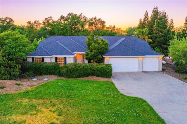 110 Agua Verdi Dr, Red Bluff, CA 96080 - ranch-style house featuring concrete driveway, a front lawn, and a garage