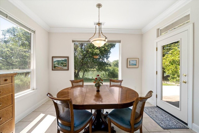 110 Agua Verdi Dr, Red Bluff, CA 96080 - dining room featuring light tile patterned floors, plenty of natural light, baseboards, and crown molding