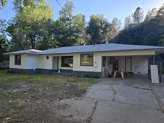 4680 Cedars Rd, Redding, CA 96001 - view of front facade featuring driveway and an attached carport