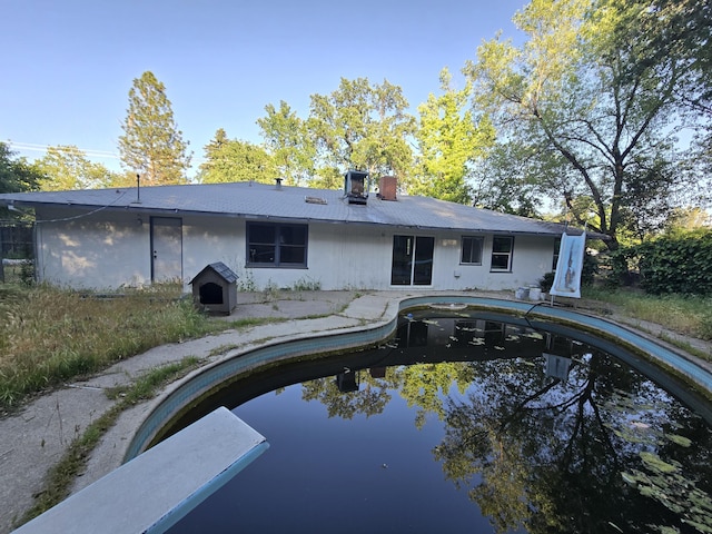 4680 Cedars Rd, Redding, CA 96001 - back of property with a chimney