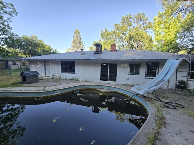 4680 Cedars Rd, Redding, CA 96001 - back of property with a chimney