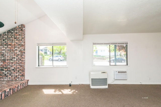 71 1st Ave, Lewiston, CA 96052 - unfurnished living room with carpet, a wall mounted air conditioner, plenty of natural light, and lofted ceiling