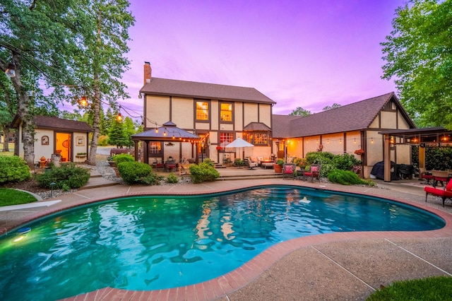 2990 Forest Hills Dr, Redding, CA 96002 - outdoor pool featuring a gazebo, a patio, and outdoor lounge area