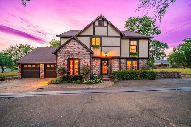 2990 Forest Hills Dr, Redding, CA 96002 - view of front of home featuring stucco siding, a garage, brick siding, fence, and driveway
