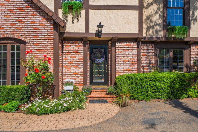 2990 Forest Hills Dr, Redding, CA 96002 - doorway to property featuring stucco siding and brick siding