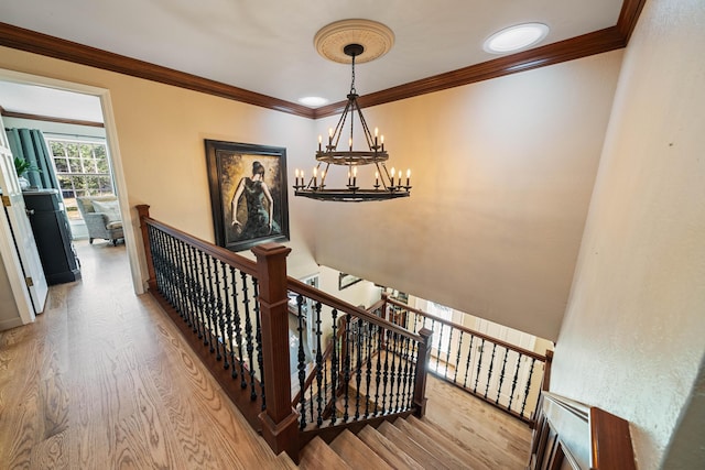 2990 Forest Hills Dr, Redding, CA 96002 - stairs with a chandelier, wood finished floors, and ornamental molding