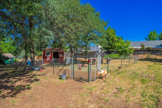 2990 Forest Hills Dr, Redding, CA 96002 - view of yard featuring fence, an outdoor structure, and exterior structure