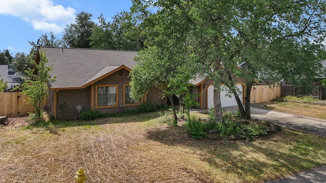 1152 Edgewood Dr, Redding, CA 96003 - view of front of house with concrete driveway, a shingled roof, and a garage