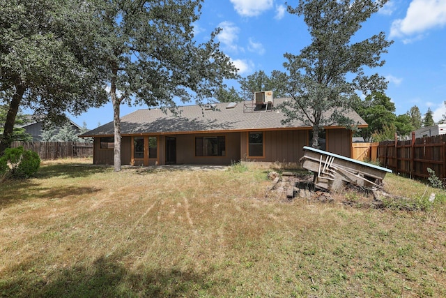 1152 Edgewood Dr, Redding, CA 96003 - rear view of property featuring cooling unit and a chimney