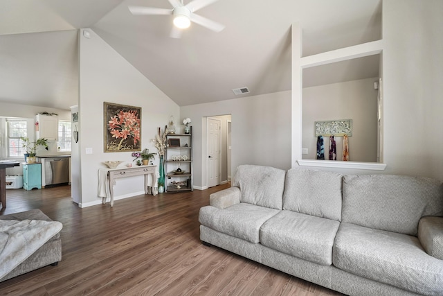 2773 Crystal Tree Dr, Redding, CA 96001 - living area featuring ceiling fan, dark wood-type flooring, high vaulted ceiling, and baseboards