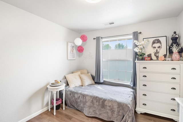 2773 Crystal Tree Dr, Redding, CA 96001 - bedroom with wood finished floors and baseboards