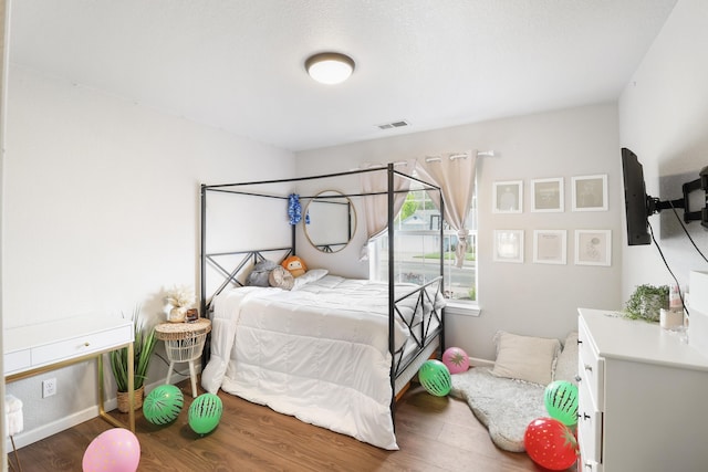 2773 Crystal Tree Dr, Redding, CA 96001 - bedroom with wood finished floors and baseboards