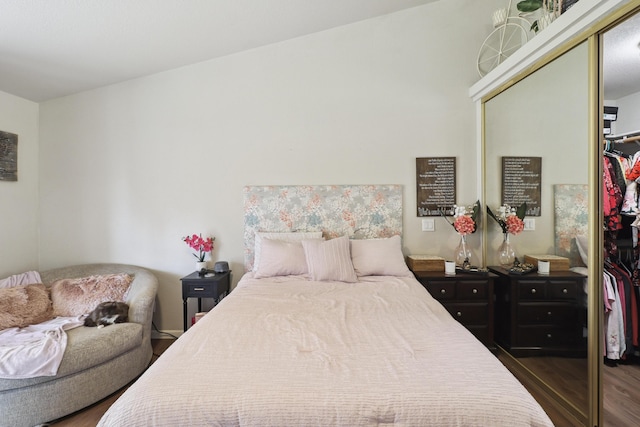 2773 Crystal Tree Dr, Redding, CA 96001 - bedroom with a closet and wood finished floors