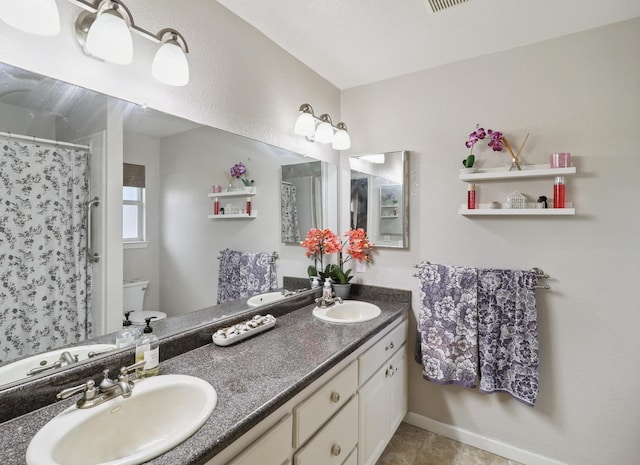 2773 Crystal Tree Dr, Redding, CA 96001 - full bath featuring toilet, double vanity, and a shower with curtain