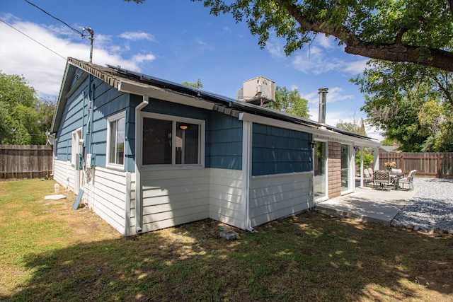 75 Sherman Dr, Red Bluff, CA 96080 - view of side of home with a patio