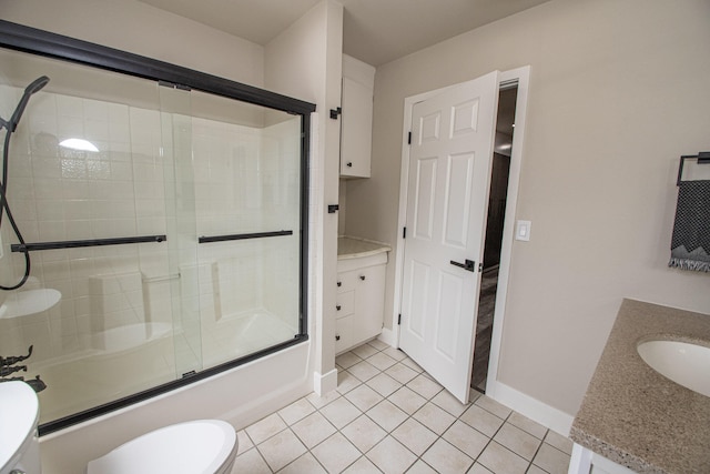 75 Sherman Dr, Red Bluff, CA 96080 - bathroom featuring vanity, bath / shower combo with glass door, tile patterned flooring, baseboards, and toilet