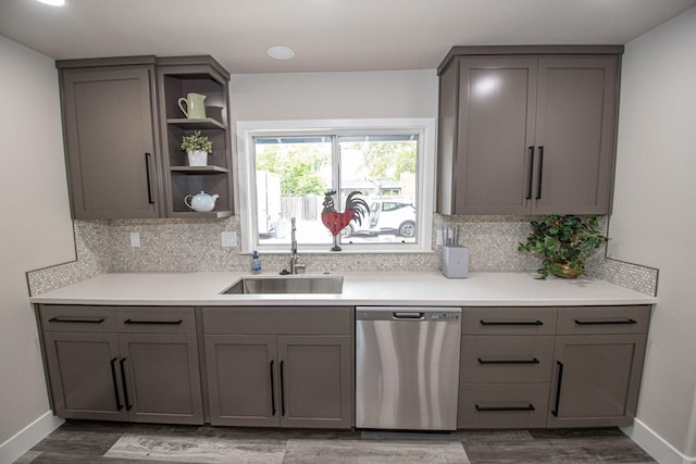 75 Sherman Dr, Red Bluff, CA 96080 - kitchen featuring dishwasher, a sink, gray cabinets, wood finished floors, and backsplash