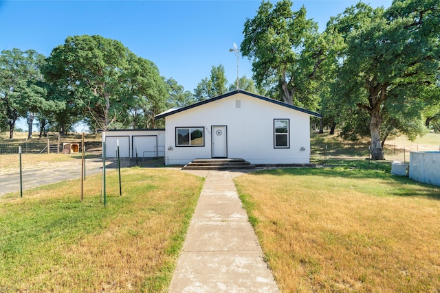 18555 Live Oak Rd, Red Bluff, CA 96080 - bungalow-style home featuring driveway and a detached garage