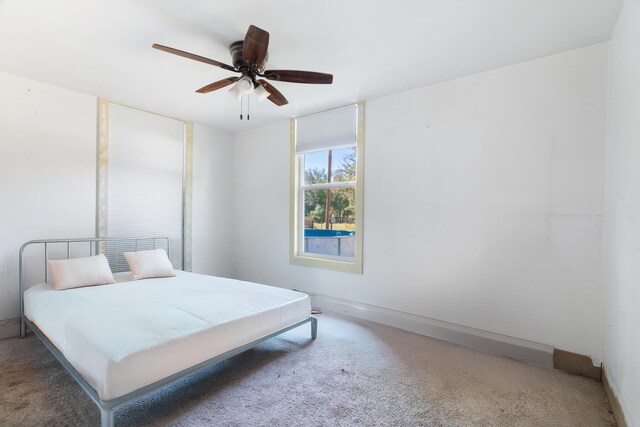 18555 Live Oak Rd, Red Bluff, CA 96080 - bedroom with carpet flooring, a ceiling fan, and baseboards