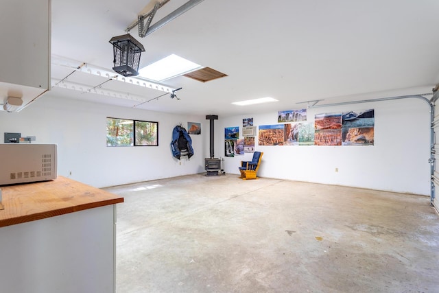 35267 Nehemiah Dr, Shingletown, CA 96088 - garage featuring a wood stove
