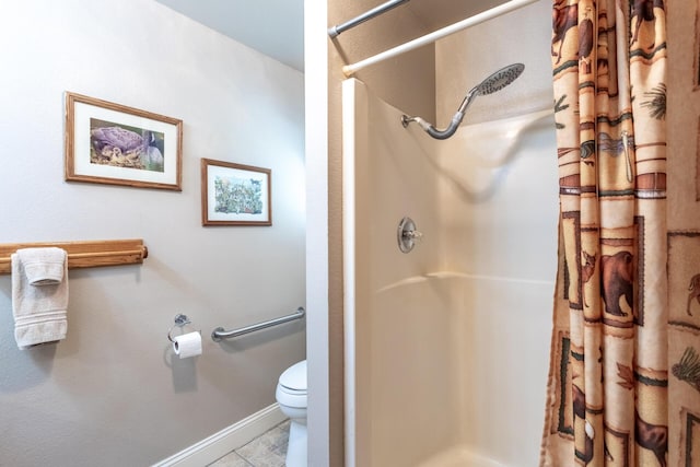 35267 Nehemiah Dr, Shingletown, CA 96088 - full bath featuring a shower stall, toilet, baseboards, and tile patterned floors