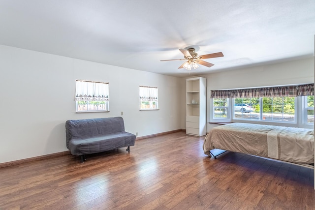 35267 Nehemiah Dr, Shingletown, CA 96088 - bedroom with multiple windows, wood finished floors, and baseboards