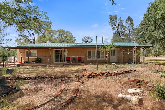 27339 Hobart Rd, Shingletown, CA 96088 - back of property with metal roof, covered porch, and a standing seam roof