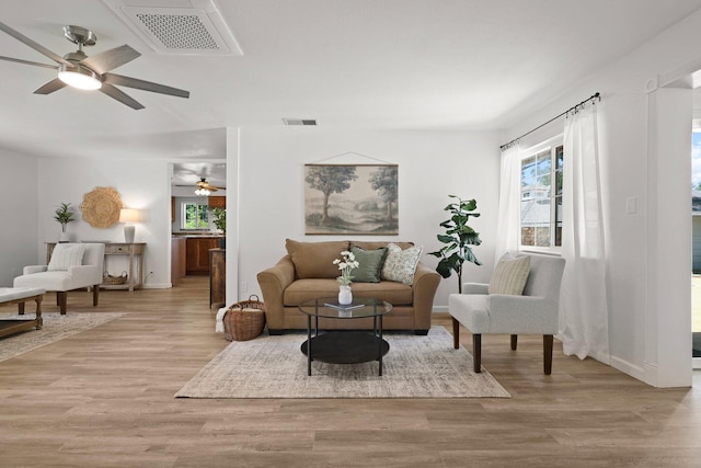 19186 Knighton Rd, Redding, CA 96001 - living area with ceiling fan, wood finished floors, and baseboards