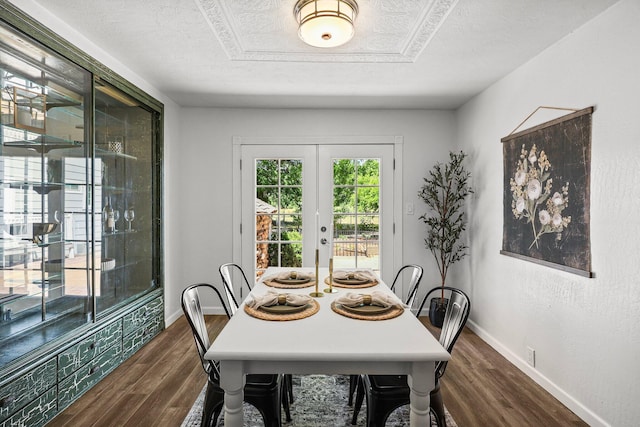 19186 Knighton Rd, Redding, CA 96001 - dining space with dark wood-type flooring, baseboards, french doors, and a textured ceiling